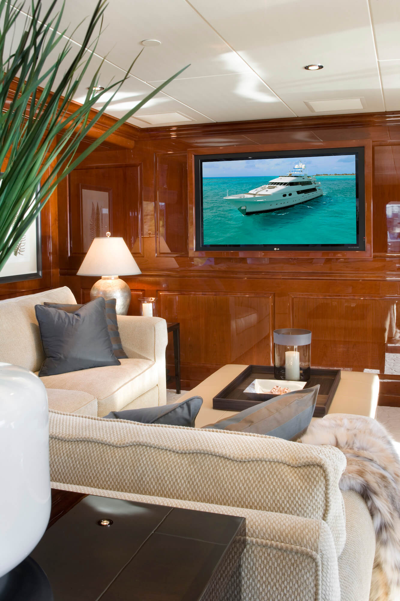 Marathon luxury yacht media room seating with TV